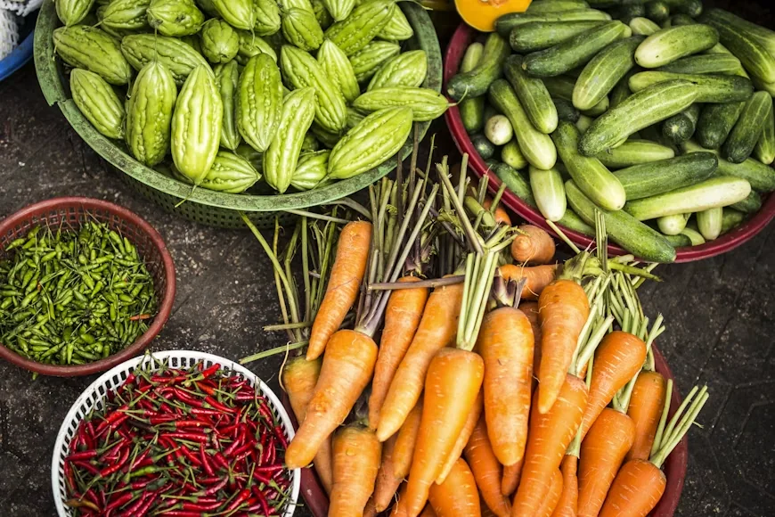 Freshly harvested vegetables sorted and graded into baskets
